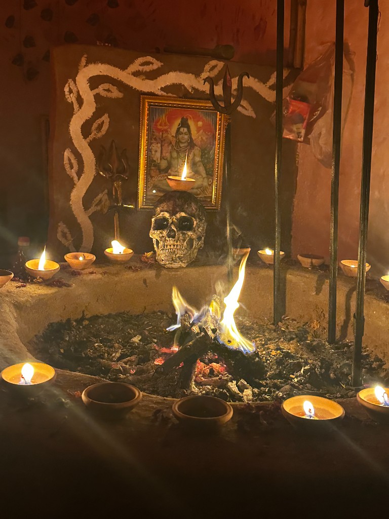 Aghori altar with Lord Shiva idol, skull and sacred fire for tantra mantra sadhana