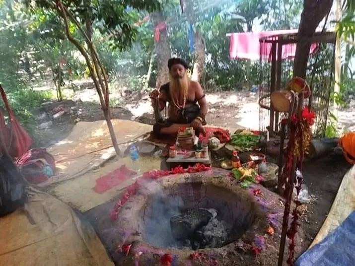 Open-air havan kund ceremony with offerings for negative energy cleansing
